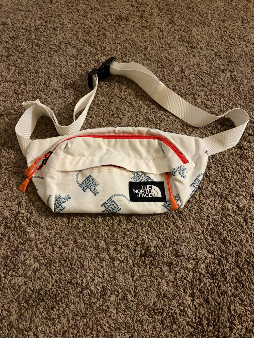 The North Face White Waist Pack with Orange Zippers